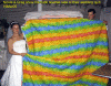 Nicole & Greg show off the quilt.